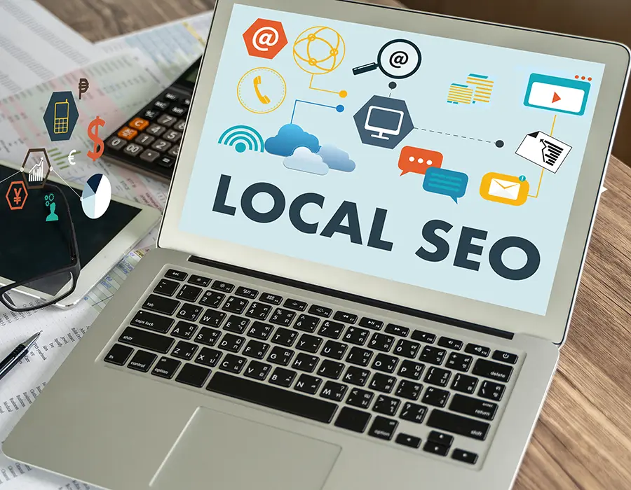 Laptop with local SEO graphic