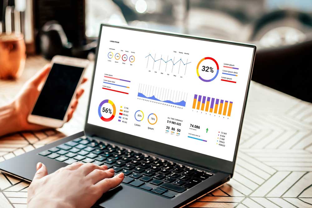open laptop displaying (SEO) analytics charts